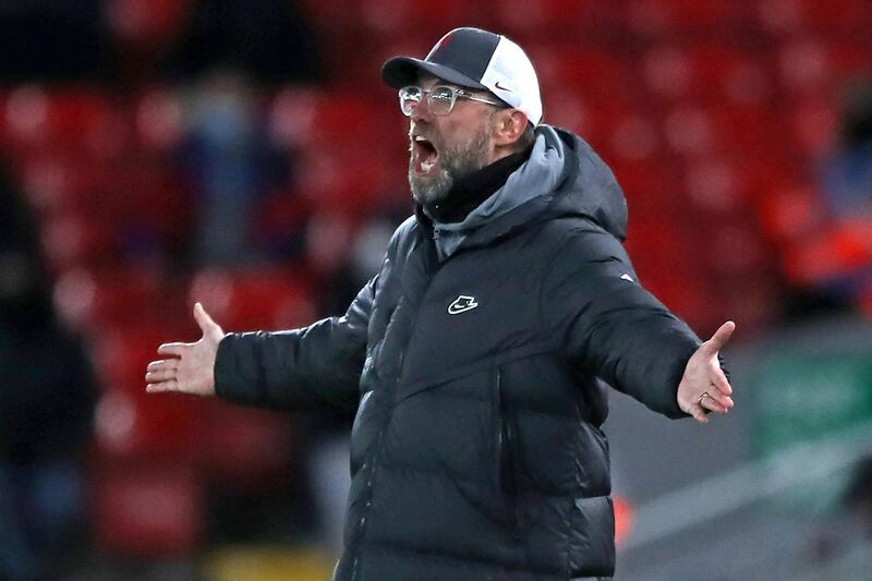 Liverpool's German manager Jurgen Klopp gestures on the touchline during the English Premier League football match between Liverpool and West Bromwich Albion at Anfield in Liverpool, north west England on December 27, 2020.  - RESTRICTED TO EDITORIAL USE. No use with unauthorized audio, video, data, fixture lists, club/league logos or 'live' services. Online in-match use limited to 120 images. An additional 40 images may be used in extra time. No video emulation. Social media in-match use limited to 120 images. An additional 40 images may be used in extra time. No use in betting publications, games or single club/league/player publications.
 / AFP / POOL / Nick Potts / RESTRICTED TO EDITORIAL USE. No use with unauthorized audio, video, data, fixture lists, club/league logos or 'live' services. Online in-match use limited to 120 images. An additional 40 images may be used in extra time. No video emulation. Social media in-match use limited to 120 images. An additional 40 images may be used in extra time. No use in betting publications, games or single club/league/player publications.
