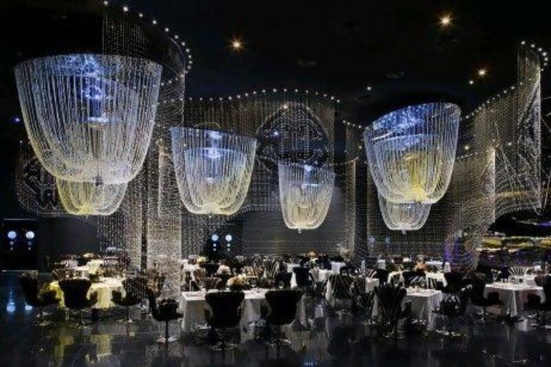 The Cavalli Club in Dubai features zebra-striped chairs and Swarovski crystal curtains. The Pragma Group plans to take the concept to Turkey.