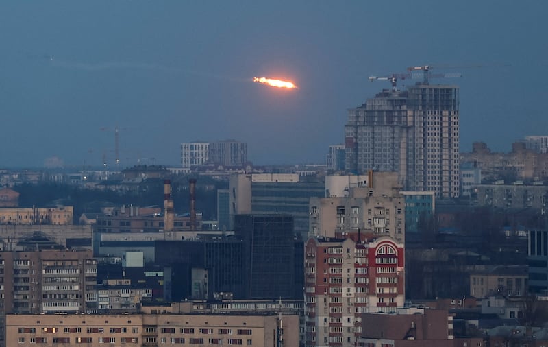A missile explodes over Kyiv during a Russian attack involving missiles and drones. Reuters