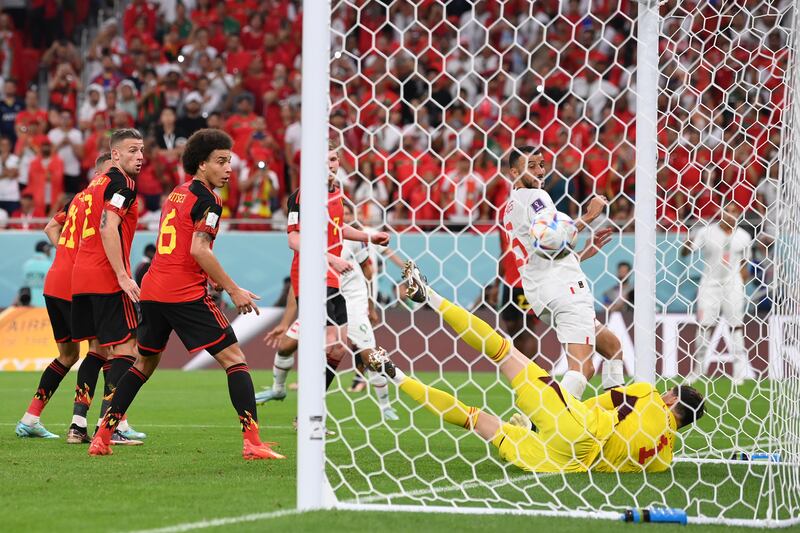 Thibaut Courtois of Belgium dives in vain as Abdelhamid Sabiri scores for Morocco. Getty