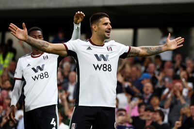 Aleksandar Mitrovic celebrates after scoring Fulham's opening goal against Brighton. Getty