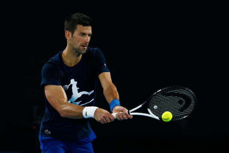 Novak Djokovic plays a backhand during a practice session ahead of the 2022 Australian Open at Melbourne Park. Getty Images