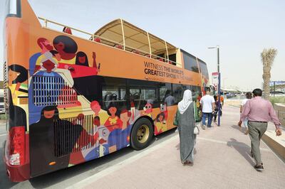 Dubai, United Arab Emirates - July 22, 2019: People get on the bus for the tour. Expo 2020 Dubai Open Doors. A sneak peek of the worldÕs greatest show now. Monday the 22nd of July 2019. Expo 2020 site, Dubai. Chris Whiteoak / The National