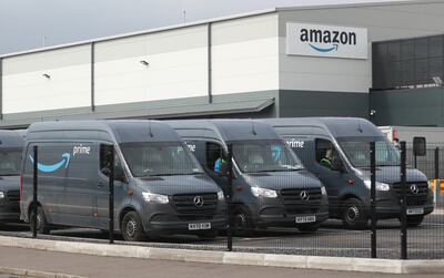 Electric delivery vans at the Amazon warehouse in the Titanic Quarter, Belfast. PA