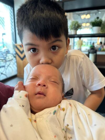 Baby Zedrick Madoginog, here with his brother Zachary, 9, was born in Sharjah at 23 weeks, weighing just 520g. Photo: NMC Hospitals