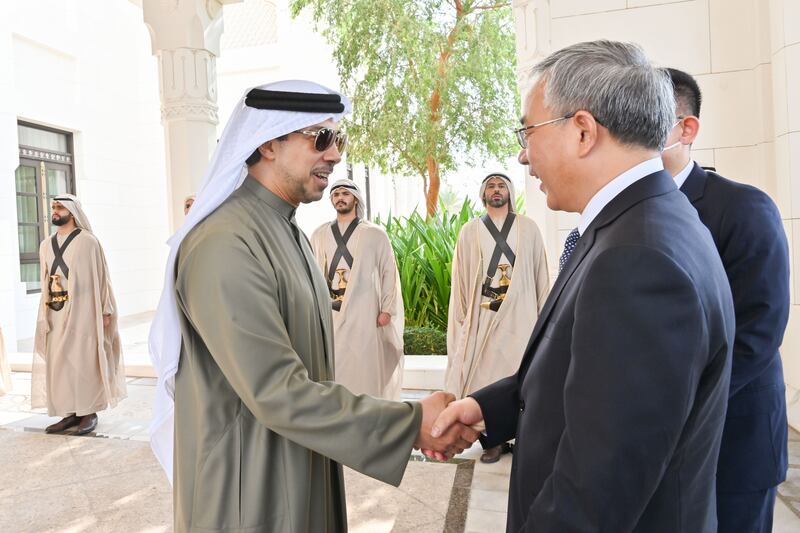 Sheikh Mansour bin Zayed, Deputy Prime Minister and Minister of the Presidential Court, greets Hu Chunhua, Vice Premier of China. Photo: Wam