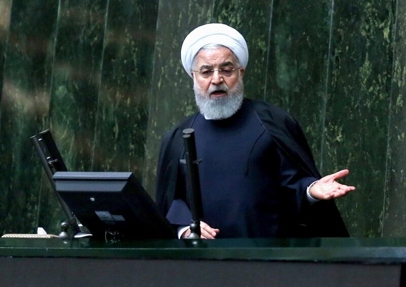 Iran's President Hassan Rouhani addresses parliament as he defends his new nominee for the Health Ministry, during a parliament session in the capital Tehran,on February 4, 2019.  / AFP / ATTA KENARE
