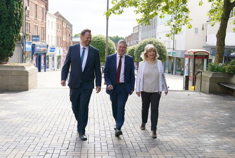 Sir Keir with local councillors Denise Jeffrey, right, and Simon Lightwood, left, on the Wakefield by-election campaign trail.