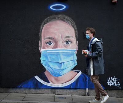 MANCHESTER, UNITED KINGDOM - JUNE 03: A mural by street artist Akse depicting an NHS nurse with a halo adorns a wall in Manchester's northern quarter on June 03, 2020 in Manchester, United Kingdom. The British government further relaxed Covid-19 quarantine measures in England this week, allowing groups of six people from different households to meet in parks and gardens, subject to social distancing rules. Many schools also reopened and vulnerable people who are shielding in their homes are allowed to go outside again. (Photo by Christopher Furlong/Getty Images)