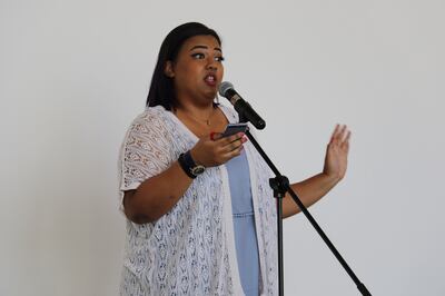 Afra Atiq, a spoken word poet and slam artist, performs at the launch of the Literaturhaus summer salon series at Nadi Al Quoz, Dubai on July 1, 2017. Courtesy Alserkal Avenue.
