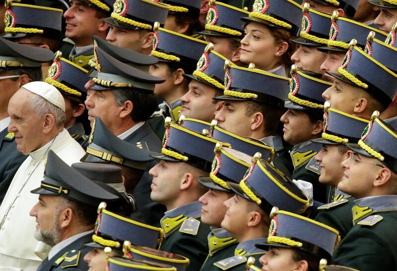 Pope Francis poses with Italian Guardia di Finanza cadets during the general audience in Paul VI hall at the Vatican. Max Rossi / Reuters