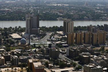 An aerial view of Baghdad. Iraq's economy shrank by about 11 per cent last year due to the Covid-19 pandemic and a sharp decline in oil revenue. Reuters