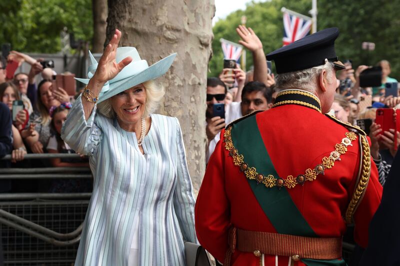 Camilla, Duchess of Cornwall, and Prince Charles greet royal well-wishers near Buckingham Palace. Bloomberg
