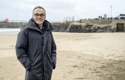 FOLKESTONE, ENGLAND - NOVEMBER 11:  Danny Byle poses for a photograph as members of the public gather on Sunny Sands Beach, Folkstone, for filmmaker Danny Boyle Pages of the Sea, commissioned by 14-18 NOW to mark the centenary of Armistice Day on November 11, 2018 in Folkestone, England.  (Photo by Chris J Ratcliffe/Getty Images for 14-18 NOW)