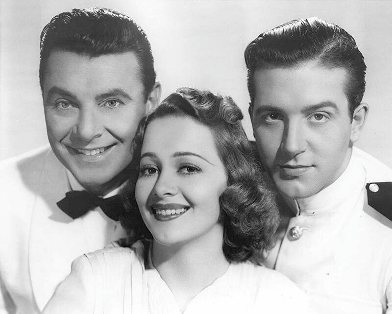 Olivia de Havilland, George Brent, and John Payne in Wings of the Navy (1939) IMDb