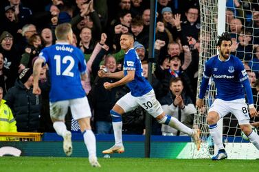 Richarlison, centre, scored the first goal and won the penalty which led to the second in Everton's 2-0 win over Chelsea. EPA