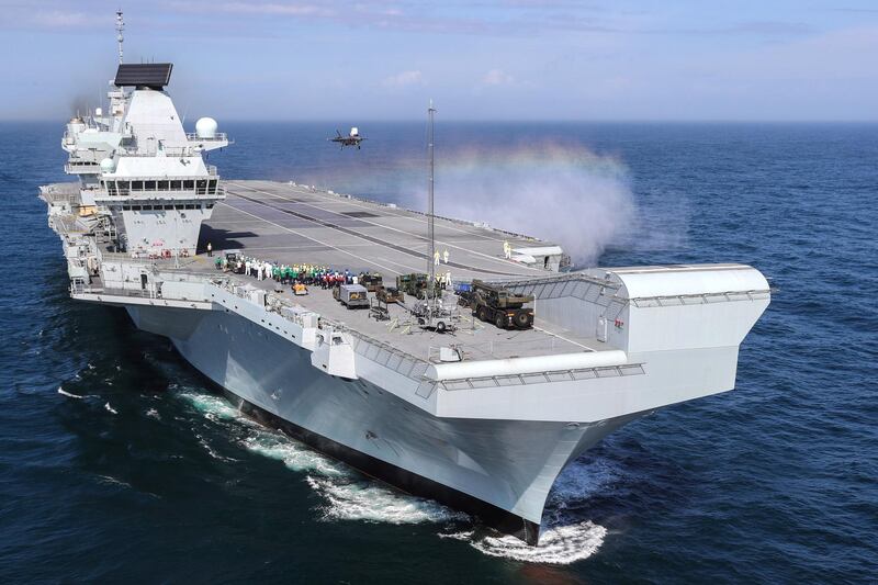 PORTSMOUTH, ENGLAND - SEPTEMBER 26: In this handout image provided by the Ministry of Defence, Royal Navy Commander, Nathan Gray lands his F-35B onboard HMS Queen Elizabeth on September 26, 2018 in Portsmouth, England.  Two F-35B Lightning II fighter jets have successfully landed onboard HMS Queen Elizabeth for the first time, laying the foundations for the next 50 years of fixed wing aviation in support of the UKs Carrier Strike Capability.
Royal Navy Commander, Nathan Gray, 41, made history by being the first to land on, carefully manoeuvring his stealth jet onto the thermal coated deck. He was followed by Squadron Leader Andy Edgell, RAF, both of whom are test pilots, operating with the Integrated Test Force (ITF) based at Naval Air Station Patuxent River, Maryland.
Shortly afterwards, once a deck inspection has been conducted and the all-clear given, Cdr Gray became the first pilot to take off using the ships ski-ramp. (Photo by LPhot Kyle Heller/Ministry of Defence via Getty Images)