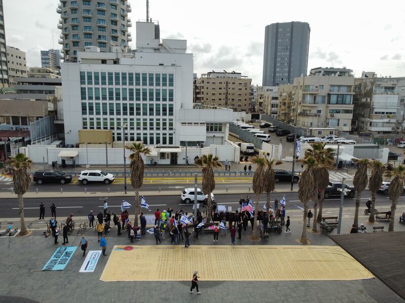 Israeli and American citizens demonstrate next to a large model of Israel's Declaration of Independence during a protest against the government justice system reform plan, in front of the USA Embassy in Tel Aviv, Israel.  Controversial judicial reform plans to weaken the authority of the supreme court proposed by government of Prime Minister Benjamin Netanyahu were met by mass protests.   EPA 