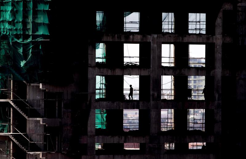 A man walks through the construction site of the new Sheraton hotel in Kathmandu, Nepal. EPA