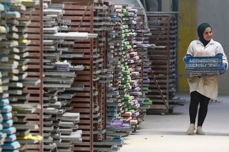 A worker at a factory in the Jordanian city of Karak on June 13, 2022.  AFP