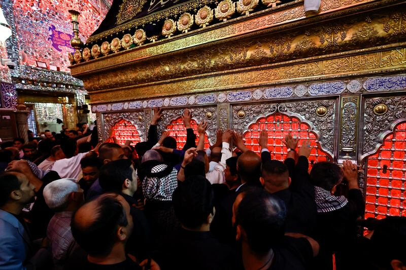 Shiite pilgrims gather at the shrine