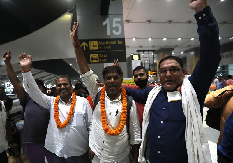 Indian citizens from Sudan arrive at Indira Gandhi International Airport in New Delhi on Wednesday. EPA