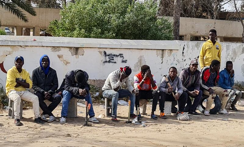 Day labourers seek casual work in Tripoli. Migrants, many from Niger, Sudan, Eritrea and other sub-Saharan African countries, gather at dawn underneath bridges in the Libyan capital in search of employment. AFP