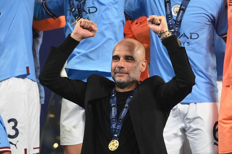Manchester City's Spanish manager Pep Guardiola celebrates with the winners' medal after winning the UEFA Champions League final football match between Inter Milan and Manchester City at the Ataturk Olympic Stadium in Istanbul. AFP