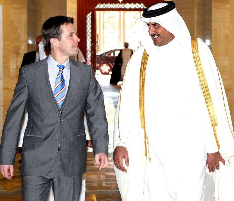 A handout picture released by the Qatari emir's office shows Qatari Crown Prince Sheikh Tamim bin Hamad al-Thani (R) greeting his Danish counterpart Frederik ahead of a meeting in Doha on January 17, 2010. The Danish crown prince is on an official visit to Qatar as part of a regional tour also including Saudi Arabia and the United Arab Emirates. AFP PHOTO/HO == RESTRICTED TO EDITORIAL USE == *** Local Caption ***  642728-01-08.jpg