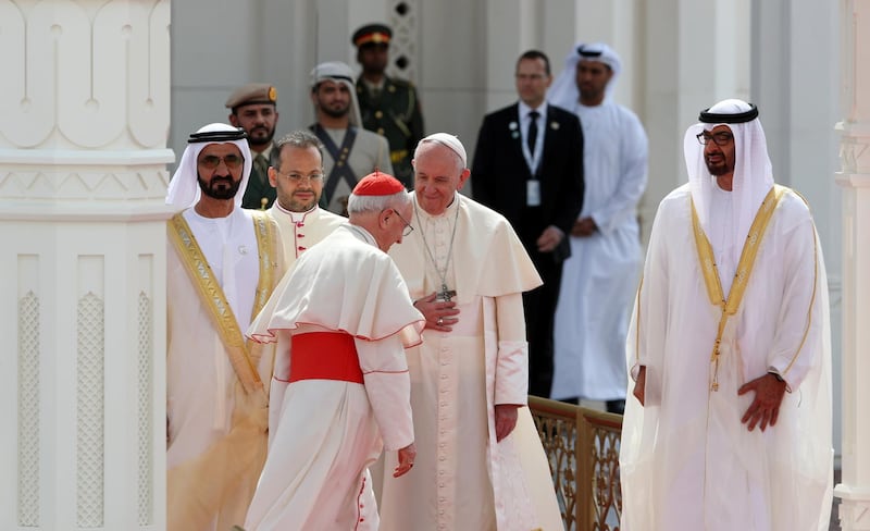 Pope Francis, Sheikh Mohamed bin Zayed, and Sheikh Mohammed bin Rashid at the welcoming ceremony. Reuters