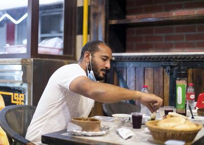 DUBAI, UNITED ARAB EMIRATES. 12 MAY 2020. 
Saeed El Orabi, 28, breaks his fast in Al Amour restaurant in Al Rigga Street.
(Photo: Reem Mohammed/The National)

Reporter:
Section: