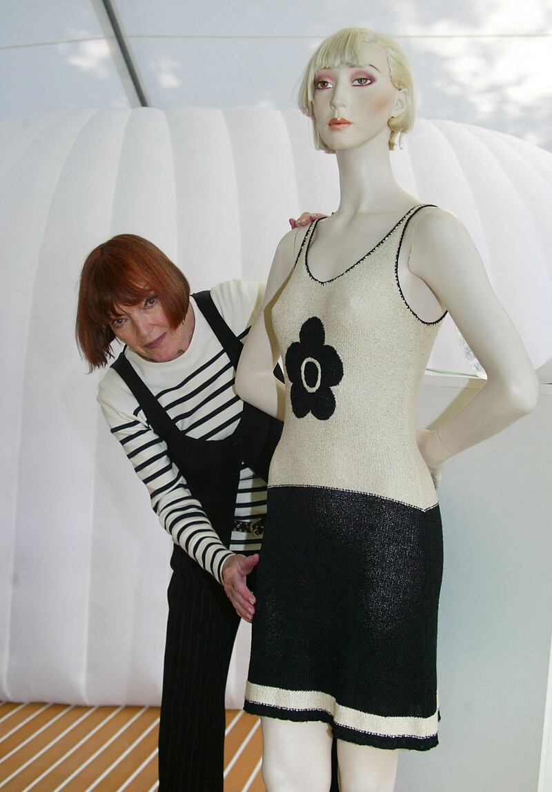 Quant dresses a model in one of her looks in Paris, 2004. AFP