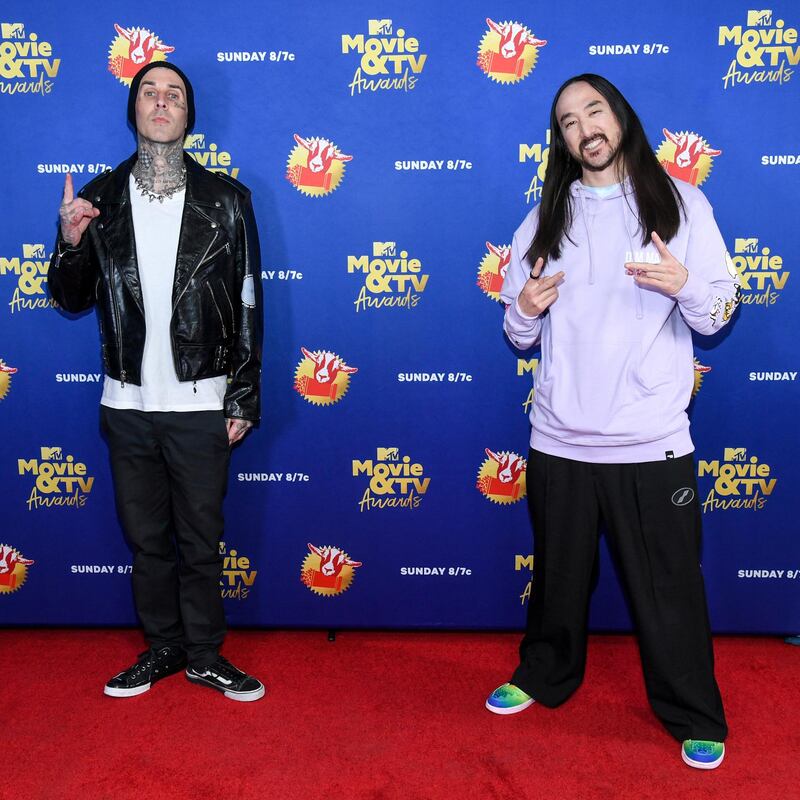 UNSPECIFIED - DECEMBER 06: In this image released on December 6, Travis Barker and Steve Aoki attends the 2020 MTV Movie & TV Awards: Greatest Of All Time broadcast on December 6, 2020. (Photo by Kevin Mazur/2020 MTV Movie & TV Awards/Getty Images)