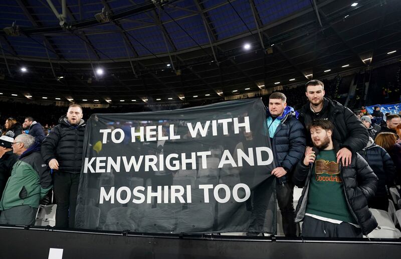 Everton fans hold up banners of protest against Everton chairman Bill Kenwright and shareholder Farhad Moshiri. AP