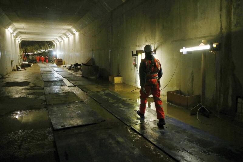 Workers in the Connaught Tunnel section of the Crossrail construction project. Crossrail is Europe’s largest civil engineering project and is due for completion in 2018. Andrew Winning / Reuters