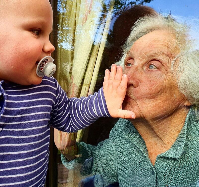 My 1-year-old little boy and his 88-year-old great grandma, who miss each other so much at the moment. I captured this beautiful moment between them whilst dropping off groceries. Kisses through glass by STEPH JAMES