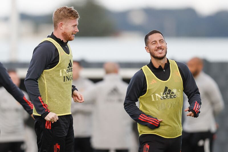 Belgium's Eden Hazard, right, and Kevin De Bruyne take part in a training session on September 21, 2022 in Tubize as part of the team's preparation for the upcoming Uefa Nations League matches. AFP