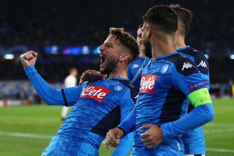 NAPLES, ITALY - FEBRUARY 25: Dries Mertens (L) of Napoli celebrates scoring the opening goal alongside Lorenzo Insigne (R)  during the UEFA Champions League round of 16 first leg match between SSC Napoli and FC Barcelona at Stadio San Paolo on February 25, 2020 in Naples, Italy. (Photo by Michael Steele/Getty Images)