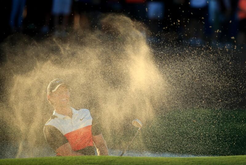 Rory McIlroy chips out the bunker on the 17th hole during day two of the DP World Tour Championship Dubai at Jumeirah Golf Estates. Getty