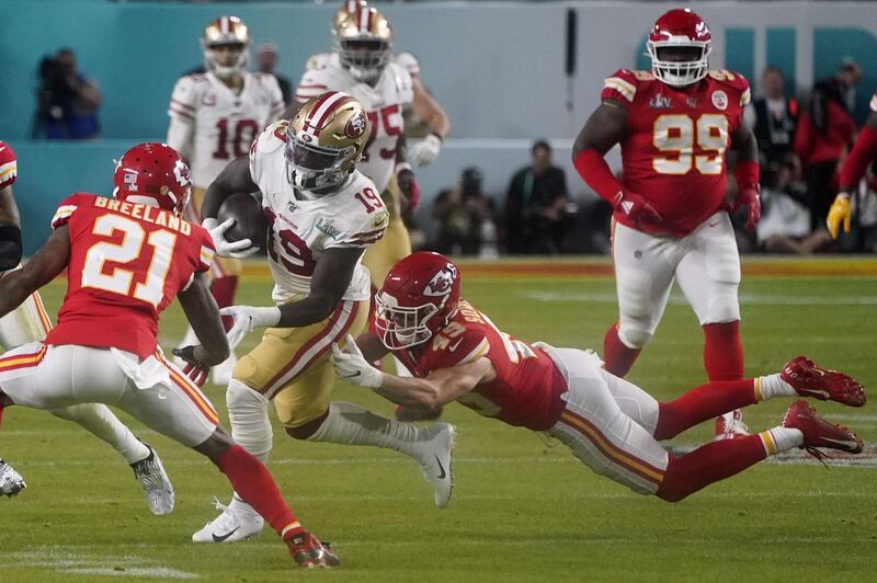 49ers wide receiver Deebo Samuel carries the ball. AFP