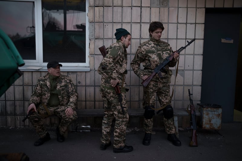 Civilian volunteers attend a Ukrainian Territorial Defence Forces training camp in Brovary, north-east of Kyiv. AP