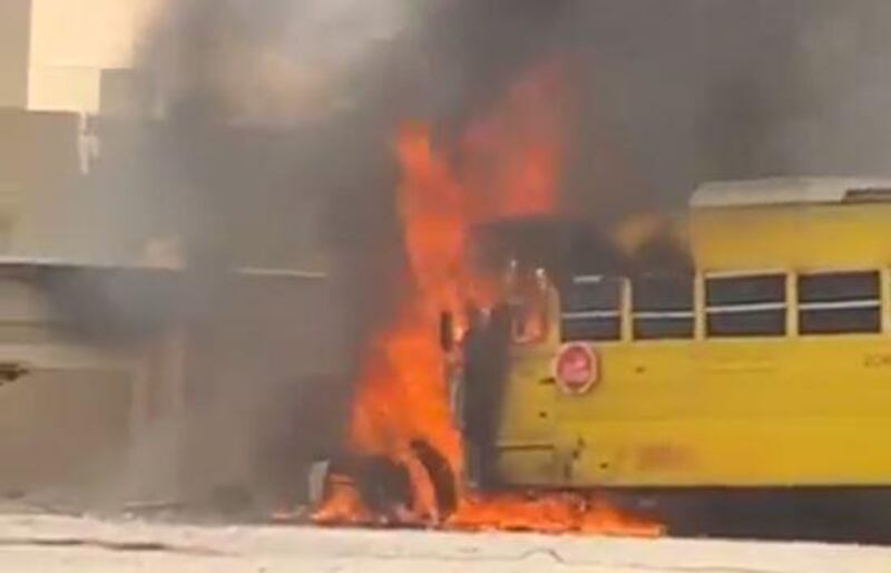 A screen grab from a video showing the bus that caught fire while parked outside Adhen School for Basic Education in Ras Al Khaimah. 