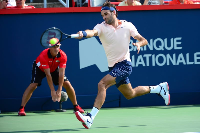 Roger Federer, of Switzerland, hits to Alexander Zverev, of Germany, during the final of the Rogers Cup tennis tournament Sunday, Aug. 13, 201, in Montreal. (Paul Chiasson/The Canadian Press via AP)