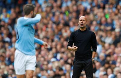 Soccer Football - Premier League - Manchester City v Fulham - Etihad Stadium, Manchester, Britain - September 15, 2018  Manchester City manager Pep Guardiola gestures to Bernardo Silva   REUTERS/Phil Noble  EDITORIAL USE ONLY. No use with unauthorized audio, video, data, fixture lists, club/league logos or "live" services. Online in-match use limited to 75 images, no video emulation. No use in betting, games or single club/league/player publications.  Please contact your account representative for further details.