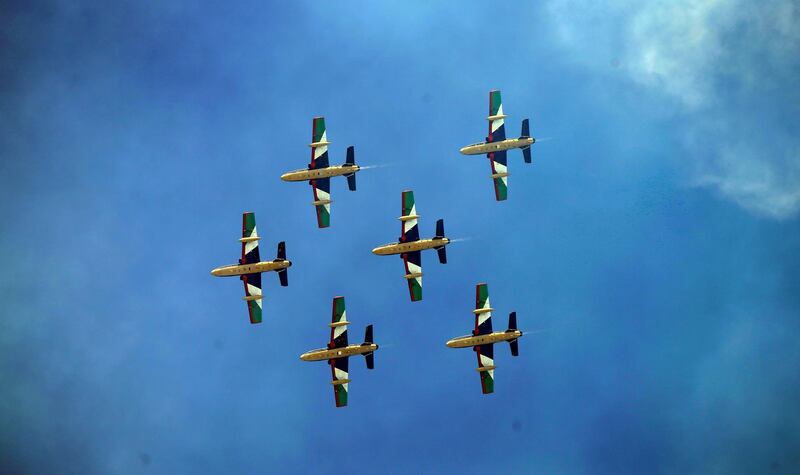 The Al Fursan National Aerobatic Team perform a fly-by. EPA