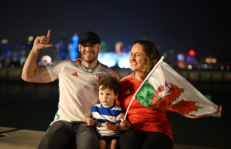 Fans watch the opening match on Doha Corniche. Getty Images