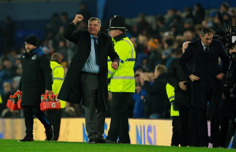 Soccer Football - Premier League - Everton vs Swansea City - Goodison Park, Liverpool, Britain - December 18, 2017   Everton manager Sam Allardyce celebrates as Swansea City manager Paul Clement looks on after the match                          Action Images via Reuters/Jason Cairnduff    EDITORIAL USE ONLY. No use with unauthorized audio, video, data, fixture lists, club/league logos or "live" services. Online in-match use limited to 75 images, no video emulation. No use in betting, games or single club/league/player publications.  Please contact your account representative for further details.