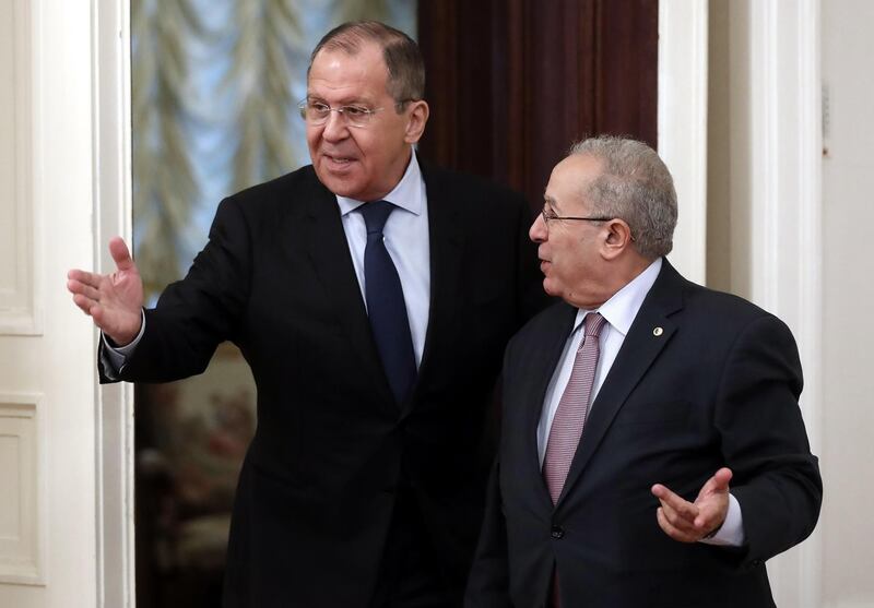 epa07447811 Russian Foreign Minister Sergei Lavrov (L) and Algerian Deputy Prime Minister and Foreign Minister Ramtane Lamamra (R) enter a hall during their meeting in Moscow, Russia, 19 March 2019.  EPA/MAXIM SHIPENKOV