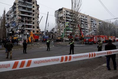 Emergency personnel work at the site where an apartment block was heavily damaged by a Russian missile strike in Dnipro on Saturday.
Reuters