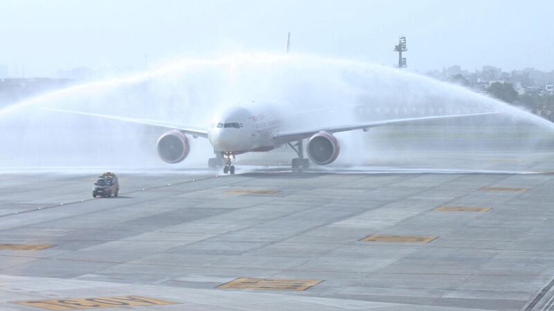 NEW DELHI, INDIA - JULY 15: An Air India aircraft arriving from New York is given a water cannon salute on its arrival at Indira Gandhi International airport's terminal T-3 on July 14, 2010 in New Delhi, India. An Air India plane carrying more than 200 passengers from New York is the first commercial flight to land at New Delhi's new, 2.7-billion-dollar airport terminal. The plane touched down at around 4:40 pm (1110 GMT). (Photo by Barcroft India / Getty Images)